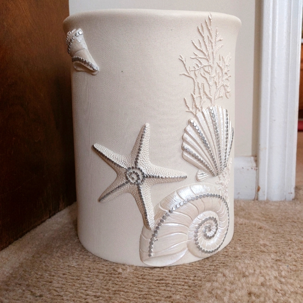 Avanti Linens Sequin Shells Wastebasket.